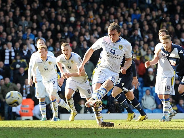Leeds' Stephen Warnock scores a penalty against Millwall on March 2, 2013