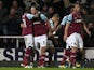 West Ham's Andy Carroll celebrates with teammates after scoring against Tottenham Hotspur on February 25, 2013