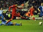Liverpool's Luis Suarez scores his hat-trick goal against Wigan on March 2, 2013