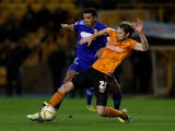 Wolverhampton Wanderers Kaspars Gorkss is tackled by Watford's Troy Deeney during the Championship match on March 1, 2013