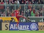 Bayern Munich's Jerome Boateng celebrates after scoring his side's third goal in their match with Fortuna Duesseldorf on March 9, 2013