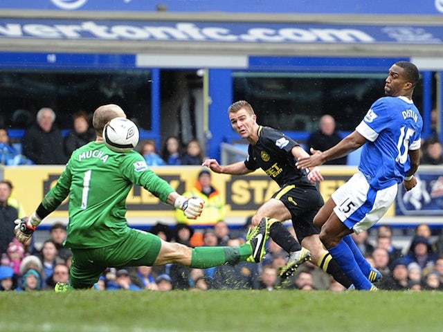 Wigan's Callum McManaman scores the second against Everton on March 9, 2013