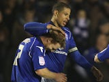 Birmingham's Curtis Davies celebrates with team mate Chris Burke after scoring the opener against Blackpool on March 5, 2013