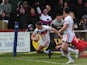 Wakefield Wildcats' Dean Collis goes over to score a try against Salford City Reds on March 10, 2013