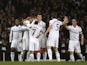 Spurs players congratulate Gylfi Sigurdsson following his goal against Inter Milan on March 7, 2013