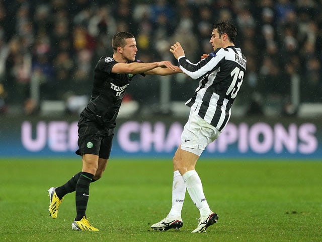 Celtic's Adam Matthews gets into an altercation with Juventus' Federico Peluso during the Champions League tie on March 6, 2013