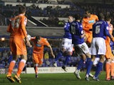 Blackpool's Kirk Broadfoot heads in the equaliser against Birmingham on March 5, 2013