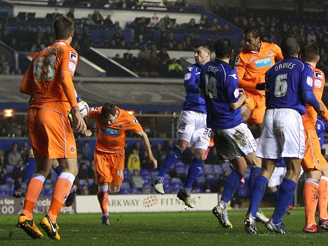 Blackpool's Kirk Broadfoot heads in the equaliser against Birmingham on March 5, 2013