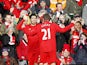 Luis Suarez is congratulated by team mate Lucas after scoring the opener against Spurs on March 10, 2013
