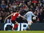 Manchester City's Carlos Tevez scores his side's first goal in their match against Barnsley on March 9, 2013