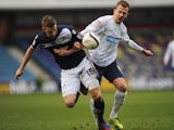 Millwall's Mark Beevers and Blackburn's Jordan Rhodes battle for the ball on March 10, 2013