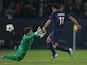 Paris Saint-Germain's Ezequiel Lavezzi scores against Valencia during their Champions League last 16 tie on March 6, 2013