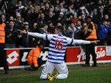 QPR's Jermaine Jenas celebrates after scoring his side's third goal against Sunderland on March 9, 2013