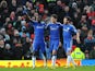 Ramires is congratulated by team mates Oscar and Juan Mata after scoring the equaliser against Manchester United in the FA Cup quarter final on March 10, 2013