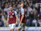 Aston Villa's Nathan Baker looks dejected after scoring an own goal during his side's clash with Reading on March 9, 2013