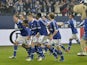 Schalke players celebrate following their 2-1 victory over Borussia Dortmund on March 9, 2013