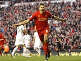 Steven Gerrard celebrates scoring a penalty and the winner against Spurs on March 10, 2013