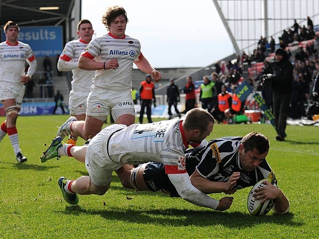 Sale Sharks' Tom Holmes scores the first try of the match against Saracens on March 10, 2013