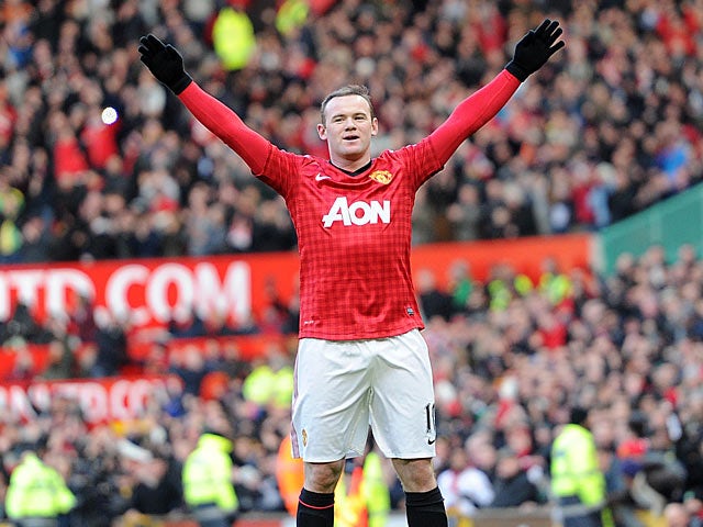 Wayne Rooney celebrates after scoring his team's second goal from a free-kick against Chelsea in the FA Cup quarter final on March 10, 2013