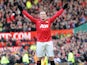 Wayne Rooney celebrates after scoring his team's second goal from a free-kick against Chelsea in the FA Cup quarter final on March 10, 2013
