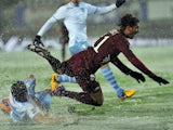 Torino's Alessio Cerci slips in horrendous conditions during the game with Lazio on March 17, 2013