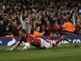 Wales' Alex Cuthbert scores a try against England during the Six Nations game on March 16, 2013
