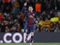 Barcelona's forward Lionel Messi celebrates scoring against AC Milan in the Champions League last 16 clash on March 12, 2013