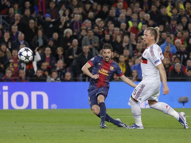 Barcelona's David Villa scores his side's third goal in their Champions League clash with AC Milan on March 12, 2013