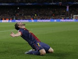 Barcelona's David Villa celebrates after scoring his side's third goal in their Champions League clash with AC Milan on March 12, 2013