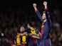Barcelona player Gerard Pique celebrates after his side knocked AC Milan out of the Champions League on March 12, 2013