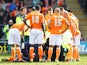 Blackpool's Barry Ferguson is treated after clattering into a teammate on March 16, 2013