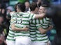 Celtic players celebrate after Kris Commons' goal against Aberdeen on March 16, 2013