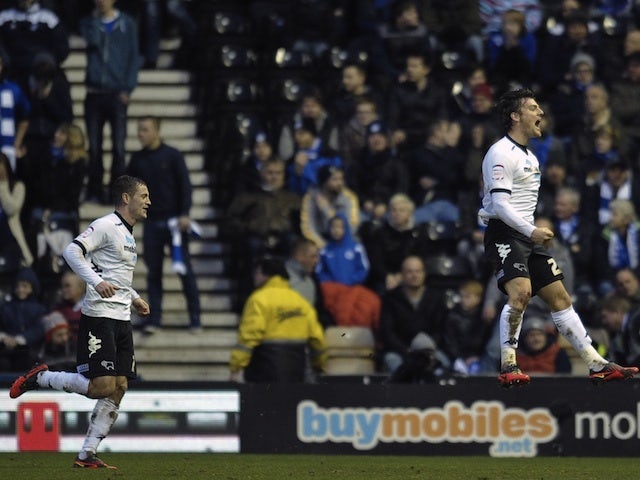 Derby's Chris Martin celebrates his goal against Leicester on March 16, 2013