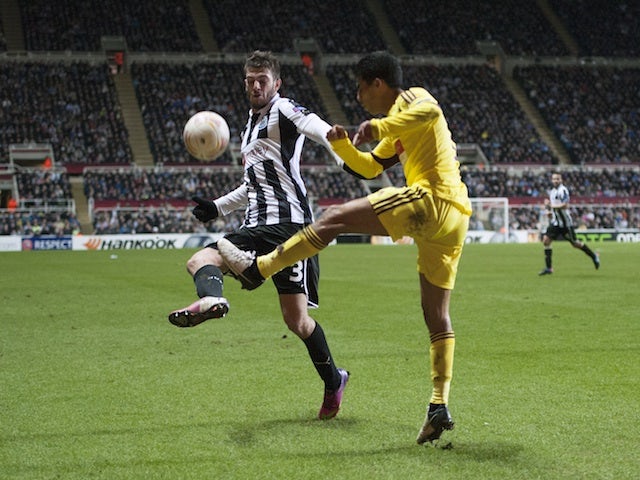 Newcastle's Davide Santon in action against Anzhi Makhachkala on March 14, 2013