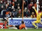 Dundee's Ryan Conroy scores during the Scottish Premier League match against Dundee United on March 17, 2013