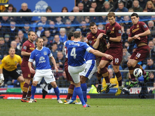 Everton's Darren Gibson takes a free-kick during his side's Premier League clash with Manchester City on March 16, 2013