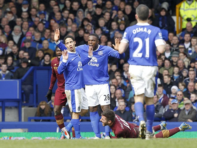 Everton's Steven Pienaar is sent off for a foul on Manchester City's Francisco Javi Garcia on March 16, 2013