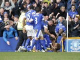 Everton players celebrate after Nikica Jelavic scored his side's second goal in their Premier League clash with Manchester City on March 16, 2013