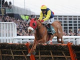 Flaxen Flare jumps the last fence during the Fred Winter Juvenile Handicap Hurdle at the 2013 Cheltenham Festival on March 13, 2013