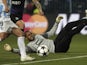 Porto 'keeper Helton lays stranded on the floor during a game with Malaga on March 13, 2013