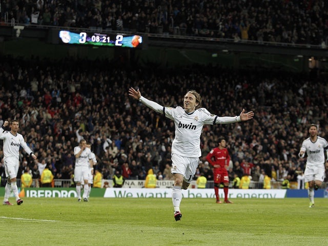 Real Madrid's Luka Modric celebrates a goal against Mallorca on March 16, 2013