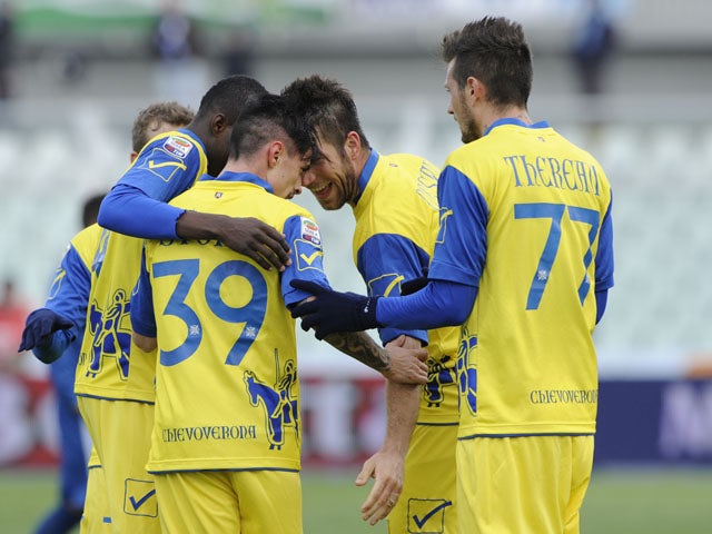 Chievo players celebrate following Adrian Marius Stoian's goal in their game against Pescara on March 17, 2013