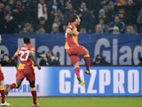 Galatasaray's Hamit Altintop celebrates scoring his side's first goal of the night in their Champions League tie with Schalke on March 12, 2013