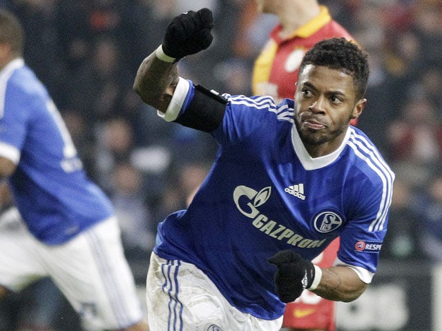 Schalke's Michel Bastos celebrates scoring his side's second goal in their match with Galatasaray on March 12, 2013