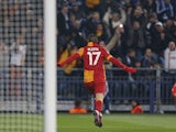 Galatasaray's Burak Yilmaz celebrates scoring his side's second goal against Schalke on March 12, 2013