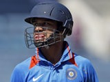 India's opening batsman Shikhar Dhawan reacts after after being caught out during his side's ODI against the West Indies on June 16, 2011