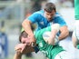 Italy's Simone Favaro tries to tackle Ireland's Peter O' Mahony during their Six Nations match on March 16, 2013
