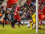 Southampton's Morgan Schneiderlin scores during his side's Premier League clash with Liverpool on March 16, 2013