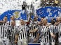 St Mirren players lift the cup after winning the Scottish League Cup final on March 17, 2013