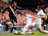 Fulham's Dimitar Berbatov battles for the ball during his side's match against Tottenham Hotspur's on March 17, 2013